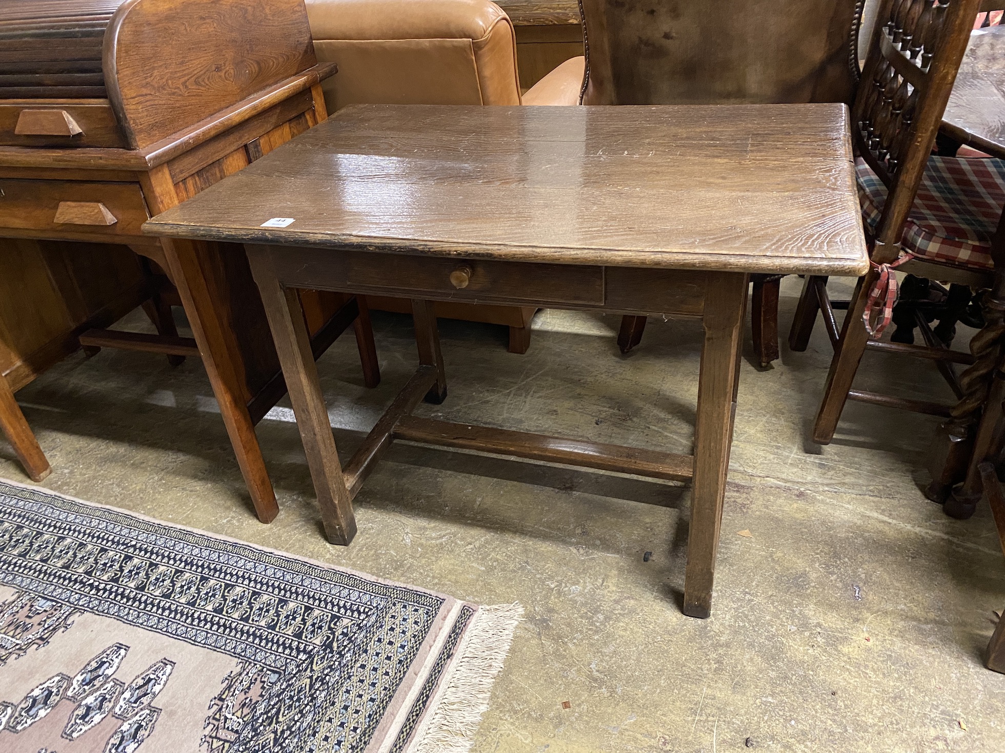 An 18th century rectangular oak side table, planked top, single frieze drawer, width 101cm, depth 68cm, height 72cm